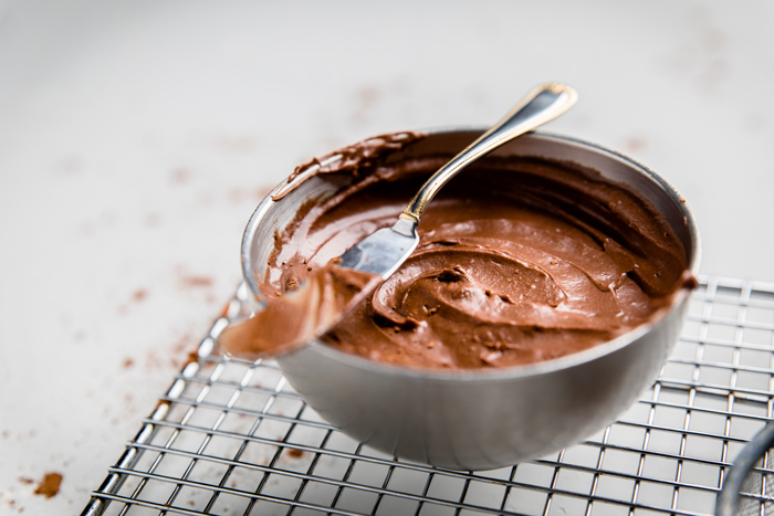 a small bowl filled with dairy free chocolate frosting.