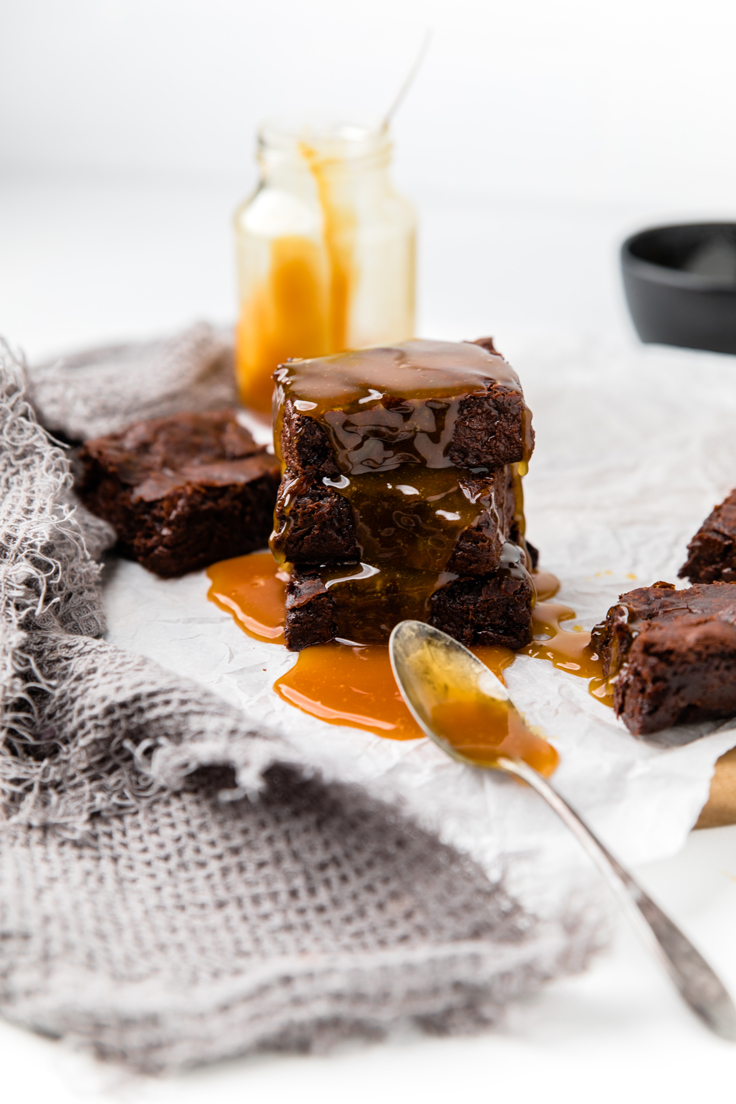 a batch of dairy free brownies with caramel.