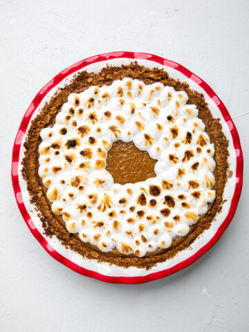 top of dairy free sweet potato pie with roasted marshmallow topping.