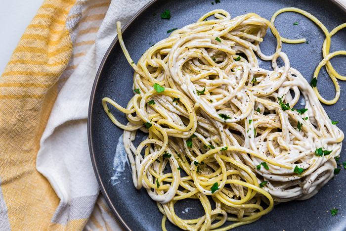 dairy free alfredo pasta on a plate.
