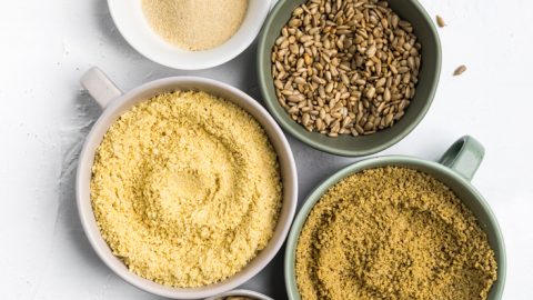 a tablescape with homemade dairy free parmesan and ingredients.