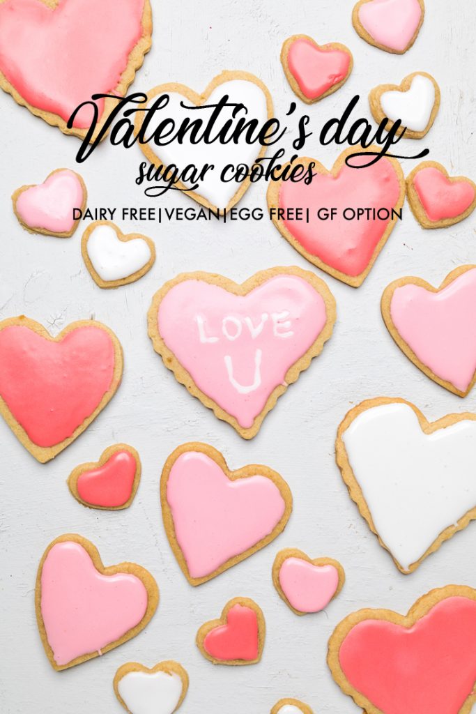heart shaped dairy free sugar cookie cutouts with the words valentines day sugar cookies overlayed.