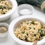 Dairy Free Garlic butter rice with kale in a white bowl.