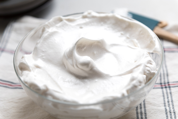 whipped vegan marshmallow fluff in a bowl.
