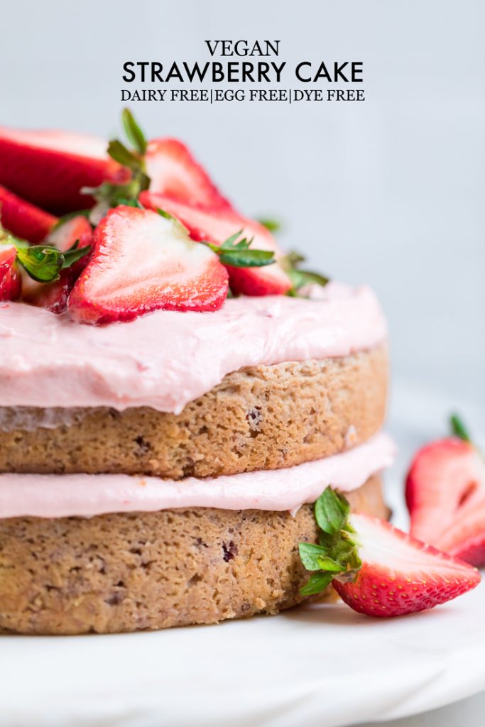 side of a vegan strawberry double layered cake.

