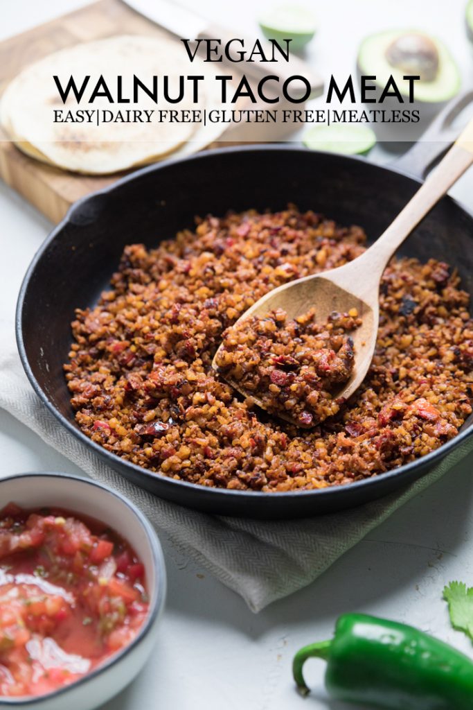 The words vegan walnut taco meat overlayed onto a skillet of them.