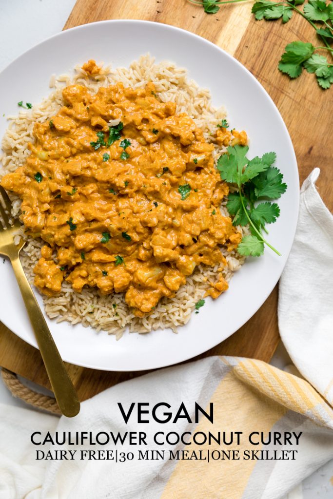the words vegan cauliflower coconut curry overlayed onto a bowl of the dish.