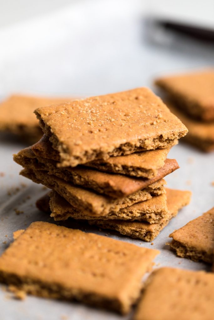 a small stack of vegan graham crackers on a table.
