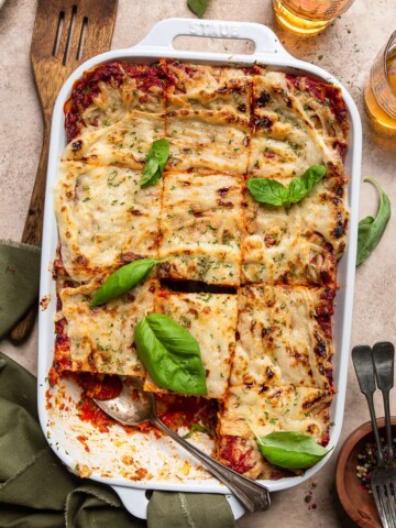 vegan lasagna in a white casserole dish.
