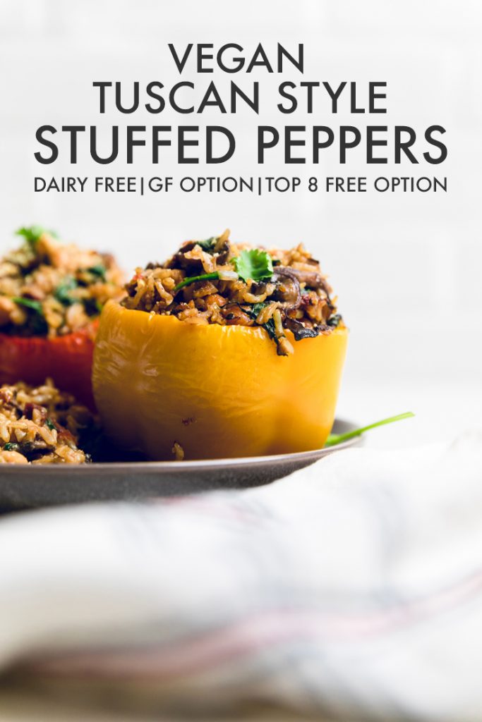the words vegan tuscan style stuffed peppers overlayed across peppers.