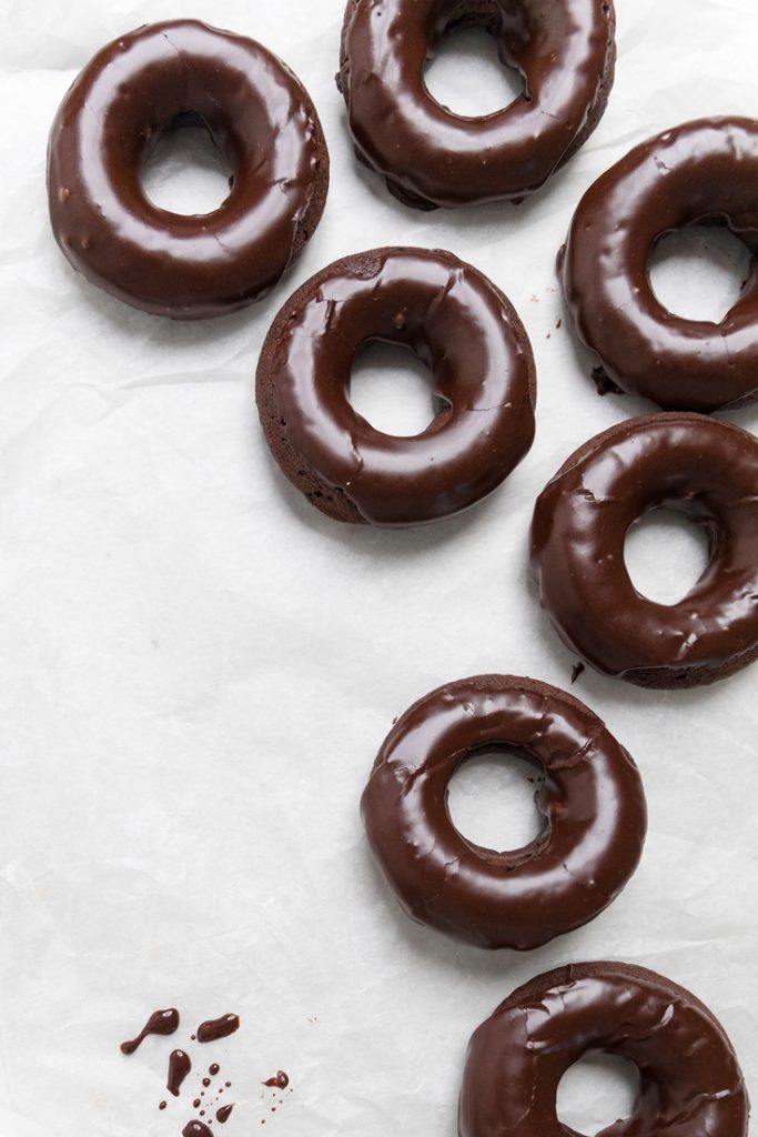 A batch of vegan chocolate donuts.