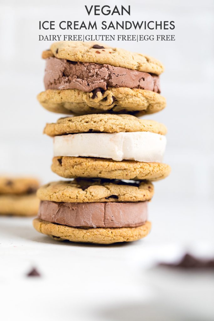 vegan ice cream sandwiches stacked together on a white table.
