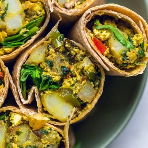 A bowl of vegan tofu breakfast burritos.