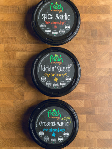 three containers of fresh cravings vegan dips.