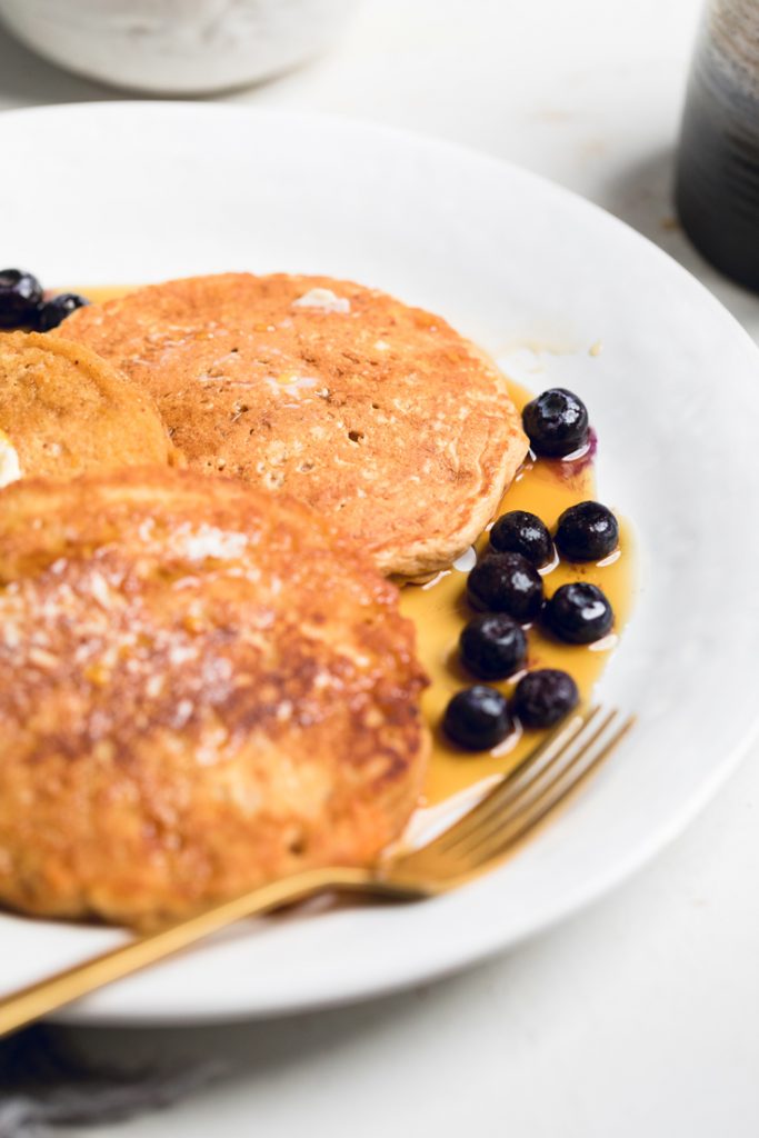 vegan sweet potato pancakes with blueberries.