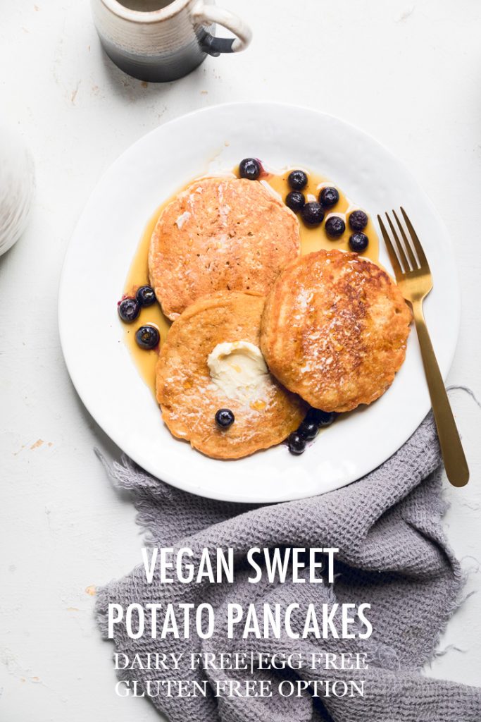 the words vegan sweet potato pancakes overlayed onto a plate of pancakes.