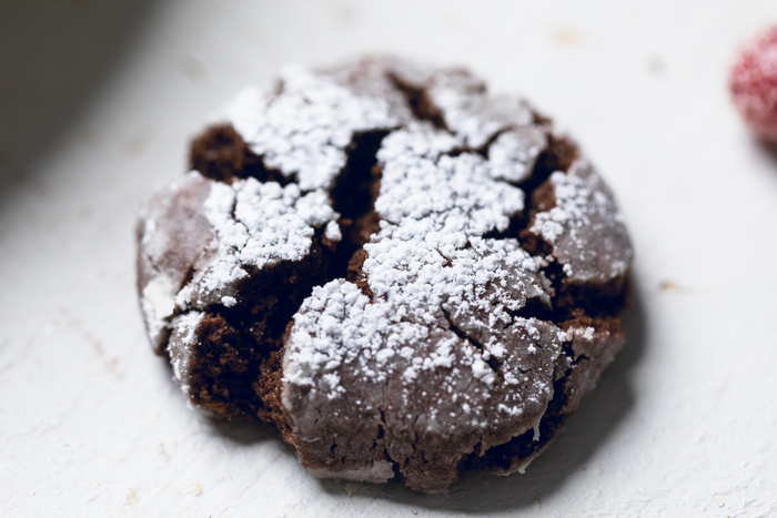 A single Vegan chocolate crinkle cookie. 