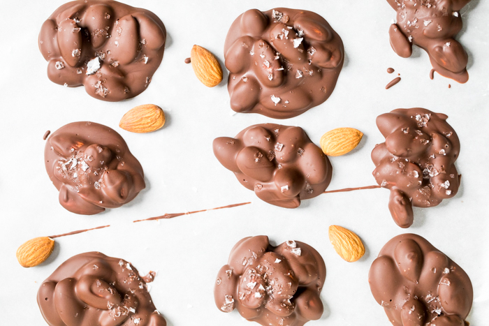 Two ingredient vegan chocolate covered almond clusters.