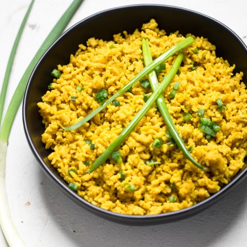 A bowl of Instant Pot vegan garlic turmeric rice.