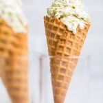 A cone of no churn vegan pistachio ice cream.