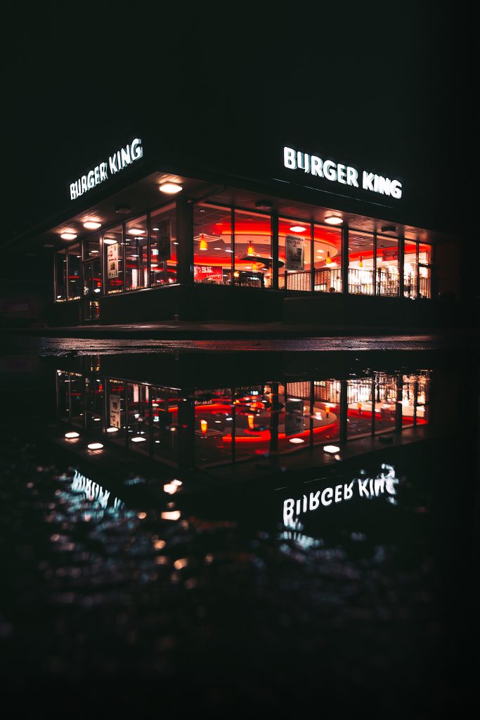 Burger King store front in the night.