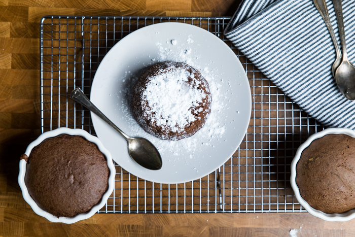 Powdered sugar on a vegan chocolate lava cake.