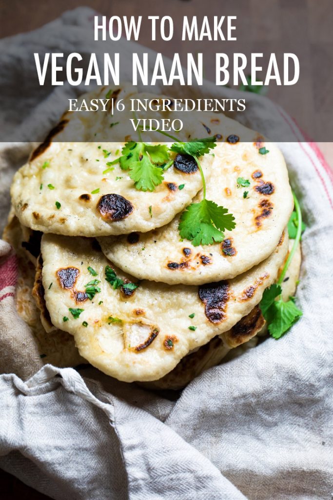 The words how to make vegan naan bread over a plate of naan.