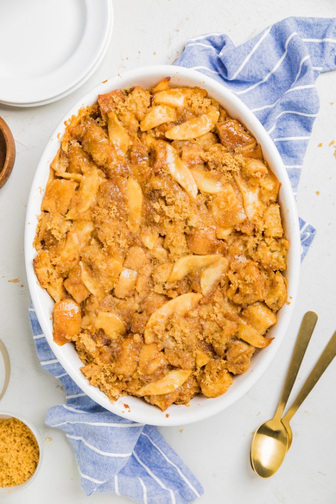 Top of a cooked dish with vegan apple pie French toast casserole.