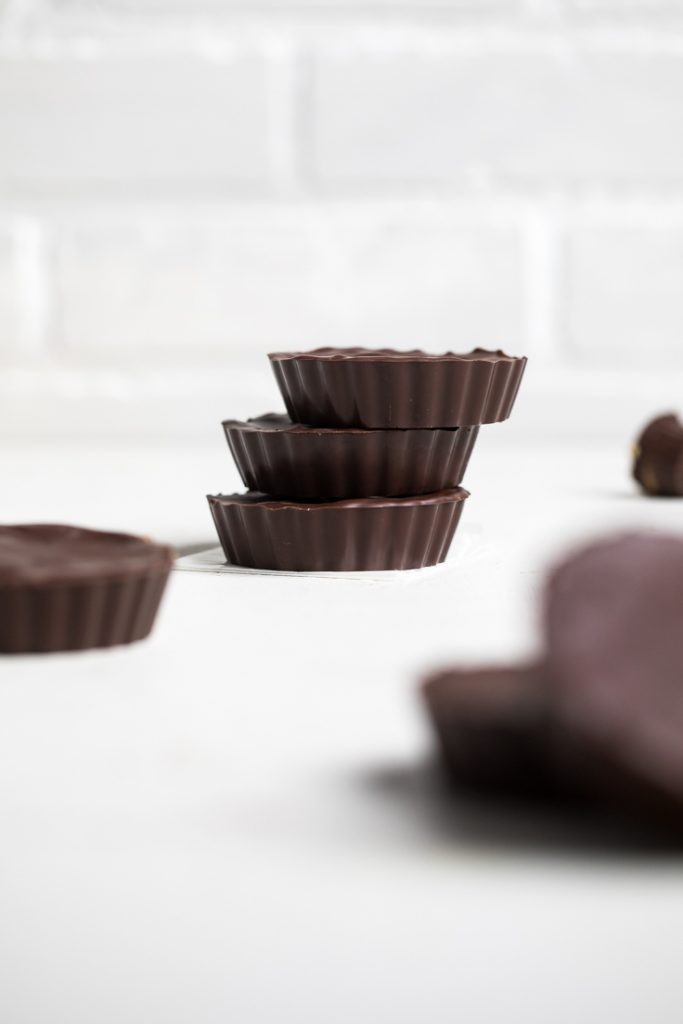 A stack of 3 vegan peanut butter cups.