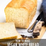 the words how to make vegan white bread overlayed across a loaf of bread.