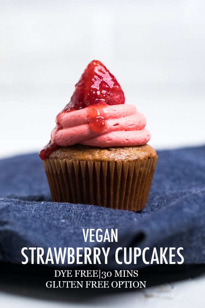 The words vegan strawberry cupcakes overlayed onto a cupcake.