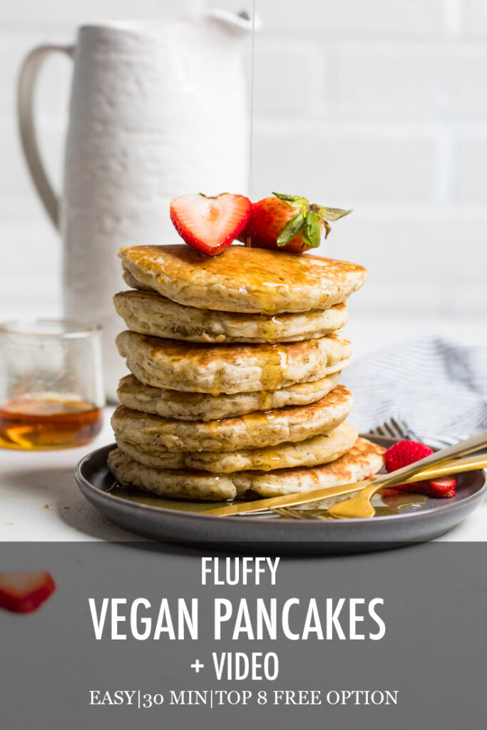 Stack of fluffy vegan pancakes with recipe name overlayed.