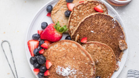 A plate of 3 ingredient vegan banana oatmeal pancakes.