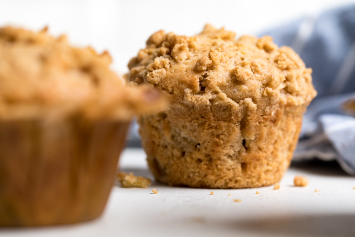 Side of a golden brown vegan apple muffin.
