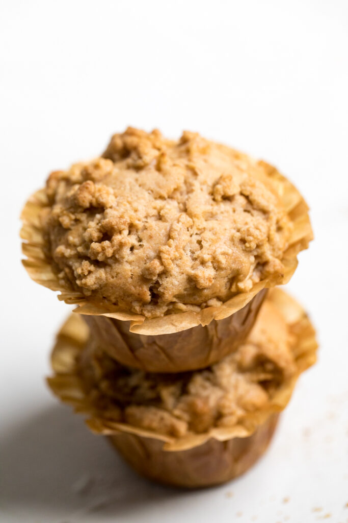 Top of vegan apple muffins with crumble topping.