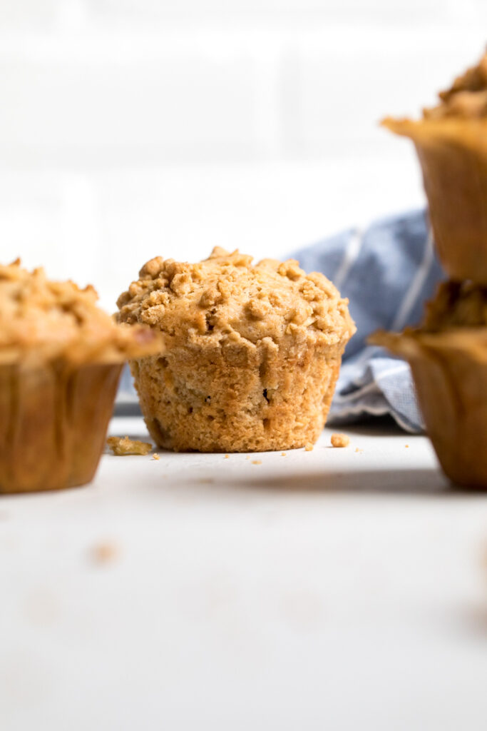 A vegan apple muffin cooked without a liner.