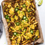 A tray of vegan walnut meat cheese fries.