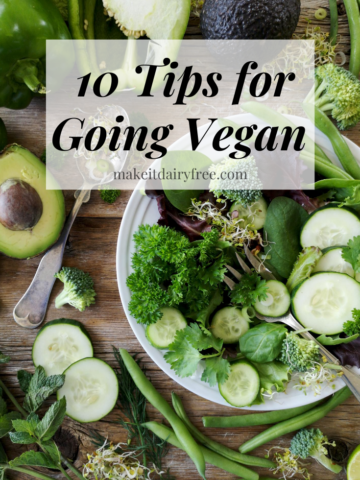 The words 10 tips for going vegan overlayed across a salad.