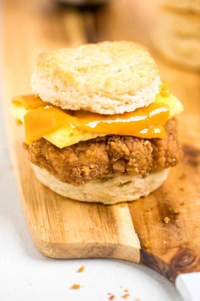 Copycat Chick-fil-a Vegan Chicken patty on a  biscuit with vegan egg and cheese.