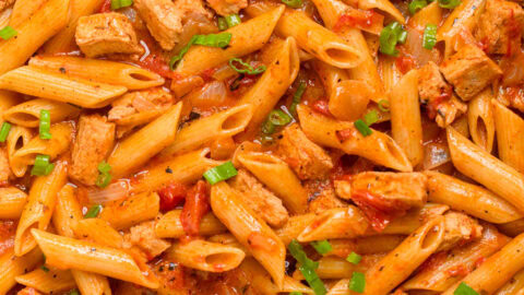 A pot of One Pot Vegan Cajun Chicken Pasta.