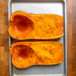 Two cooked halves of Roasted Butternut Squash.