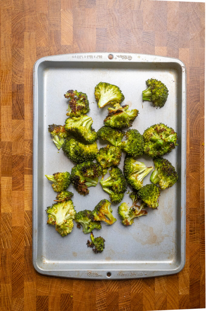A tray of roasted broccoli. 