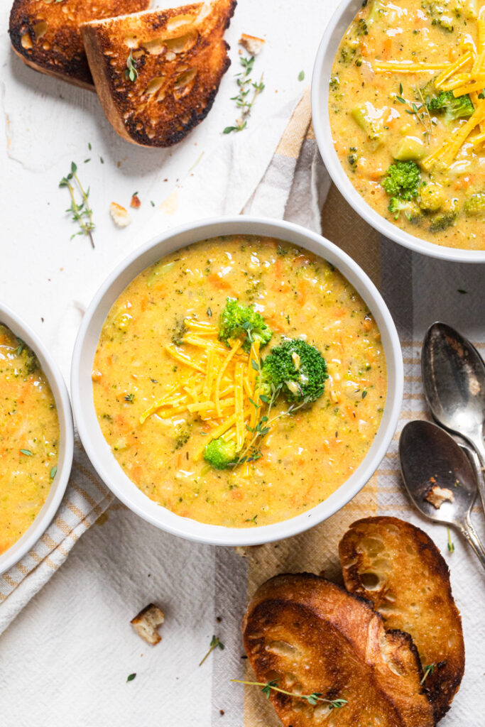 A serving bowl of vegan broccoli and cheese soup.