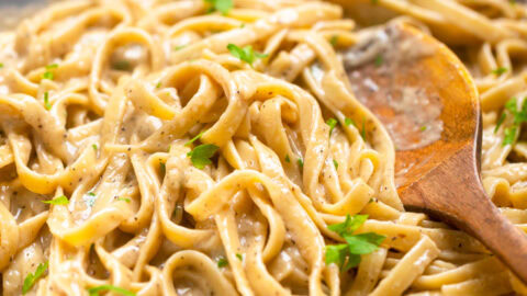 A pot of vegan one pot creamy garlic parmesan pasta.