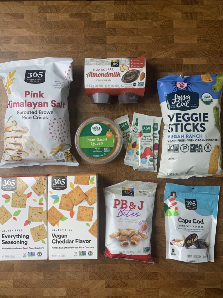A group of vegan 365 snack products on a table.