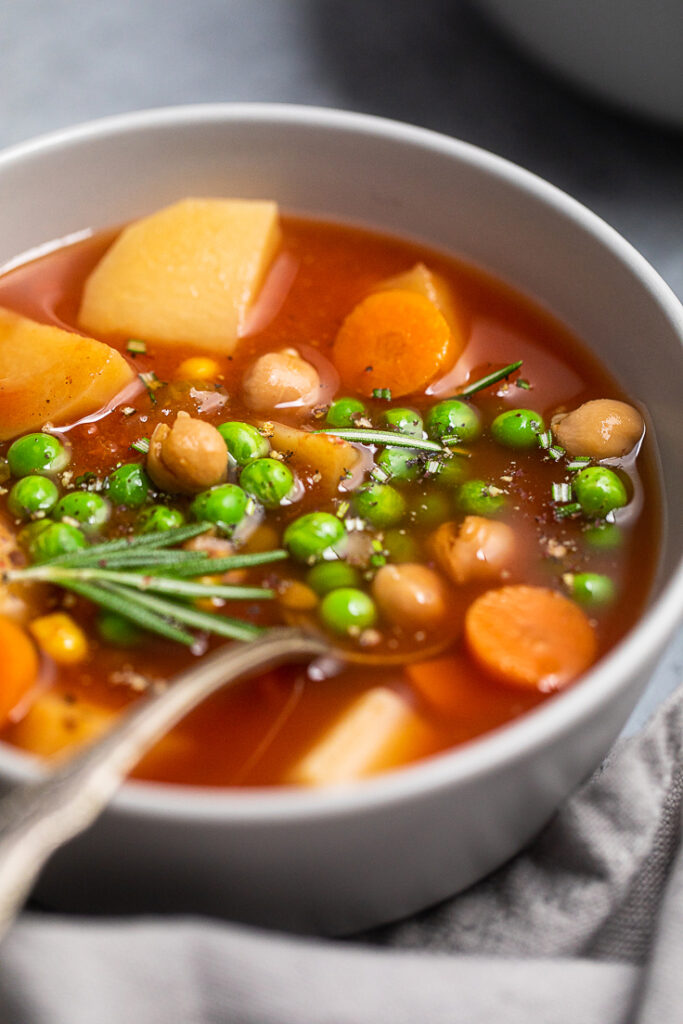 Vegan beefless stew in a gray bowl. 