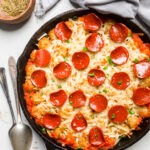 Uncut Vegan Pizza tater tot casserole with vegan pepperoni.