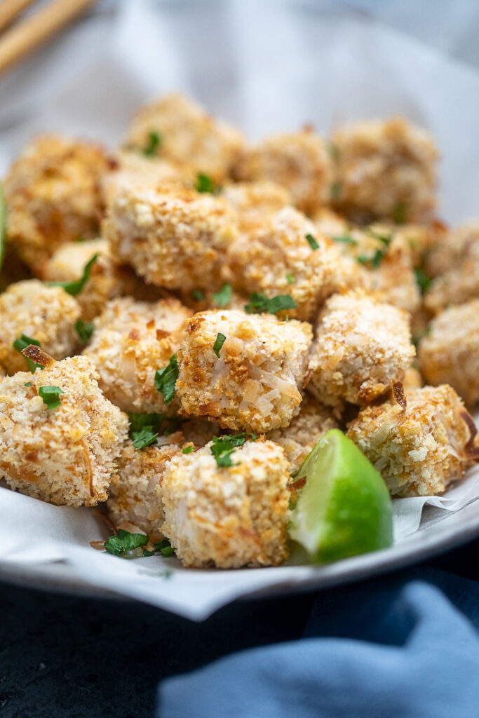 A bowl of freshly cooked Vegan Coconut Crusted Tofu.