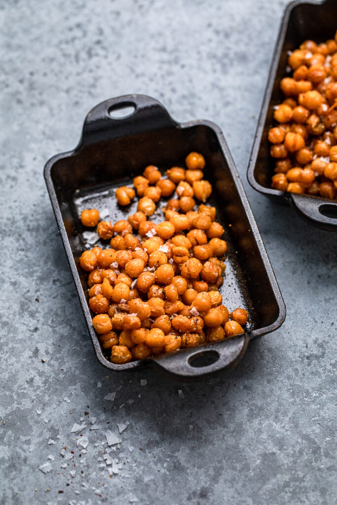 easy roasted chickpeas in a black cast iron small dish.