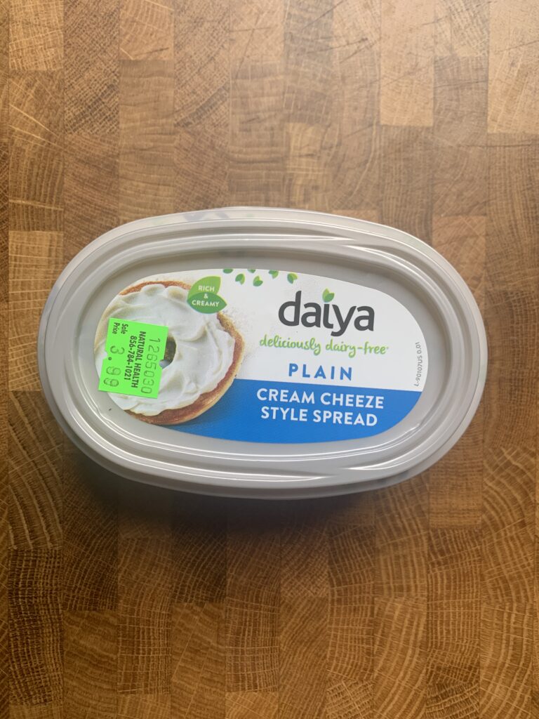 A container of Daiya dairy-free plain cream cheeze style spread.